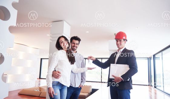 couple buying new home with real estate agent