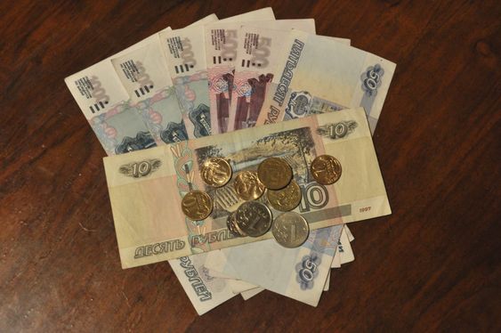 Russian money on the wooden table.
