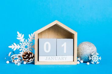 1 january. Christmas composition on colored background...