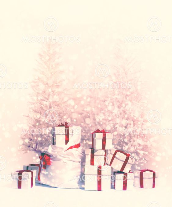 Christmas trees with heap of gift boxes