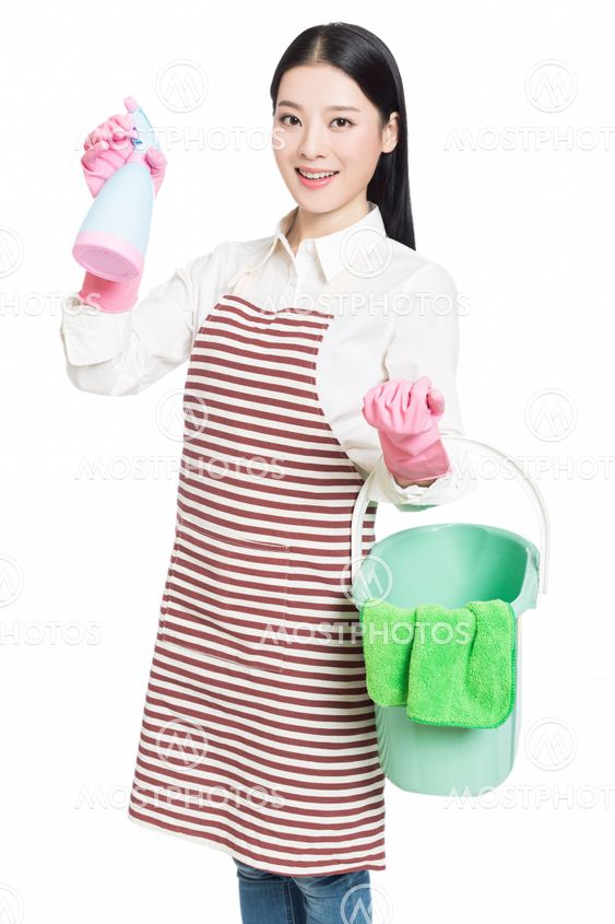 young woman cleaning on white