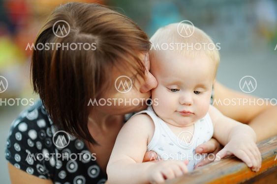 Middle aged woman and her adorable little grandson