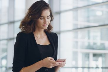 Finance, walking or businesswoman with phone in office...