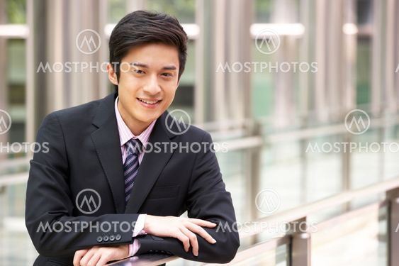 Portrait Of Chinese Businessman Outside Office
