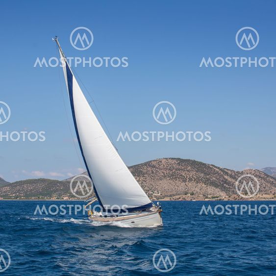 Boat competitor of sailing regatta. Yachting.