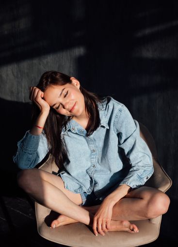 Beautiful Slim Brunette Woman in Denim Jacket Portrait