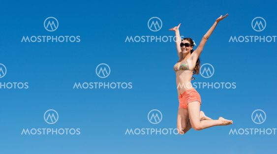 young woman jumping