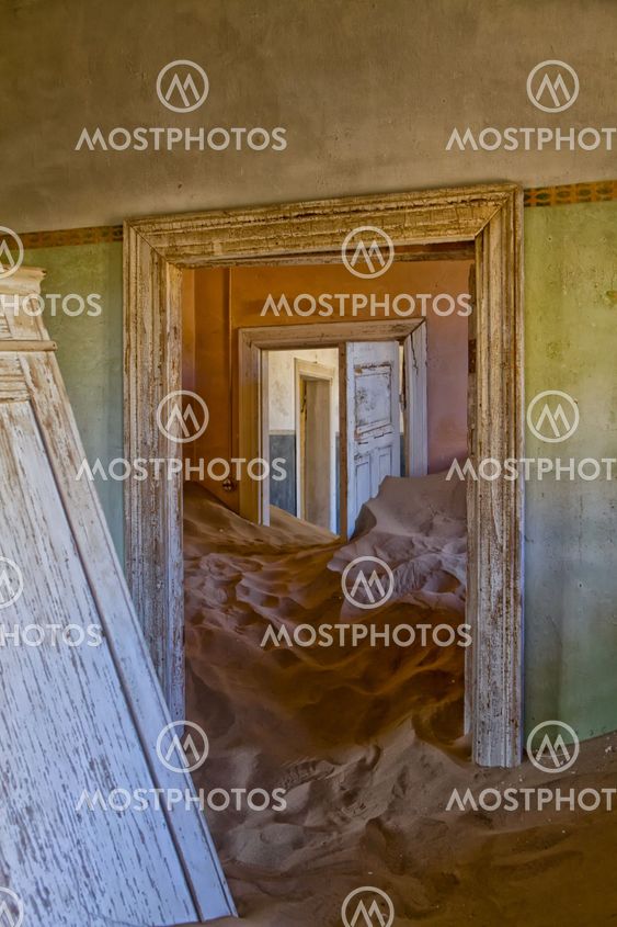 house overtaken by dune sand at kolmanskop ghost town near luderitz namibia africa