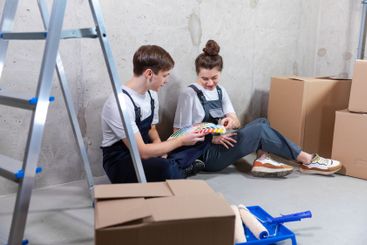 House decoration DIY renovation concept Happy couple...