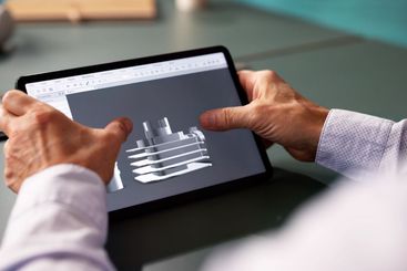 Male Engineer Developing Mechanical Parts Using 3D CAD...