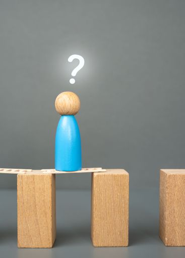 The blue man is wondering how to continue his journey...