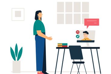 Young woman standing in her home office attending an...