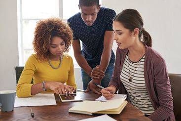 Meeting, tablet and creative team in office with...