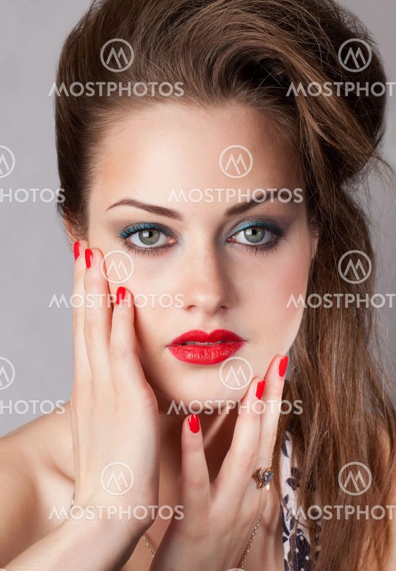 Portrait of young woman with big eyes
