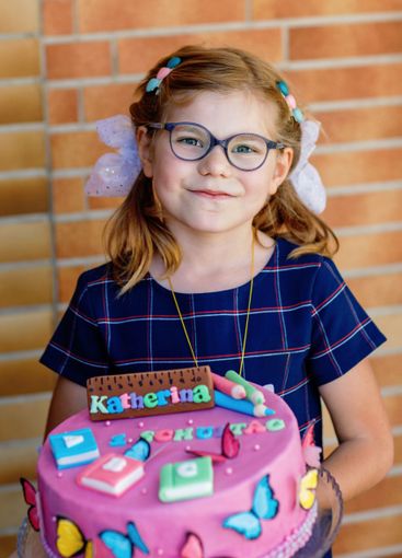 Little caucasian girl kid celebrating birthday or first...