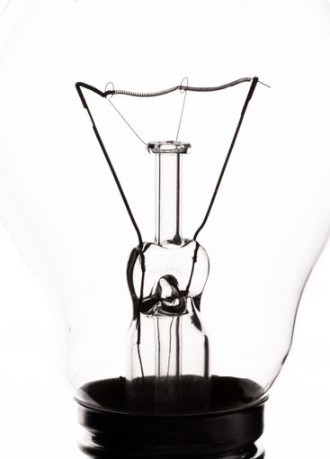 Lightbulb on white background, close up shot