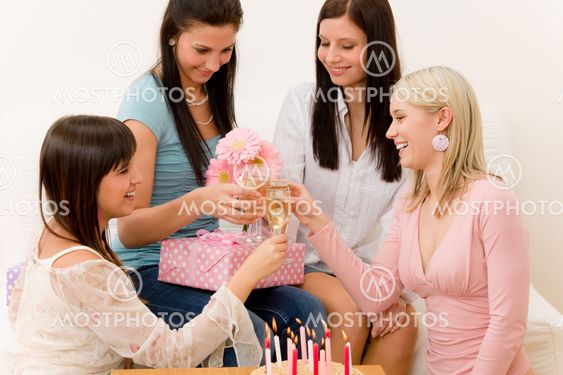 Birthday party - woman getting present and flower