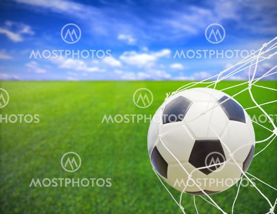 Soccer ball in gold net