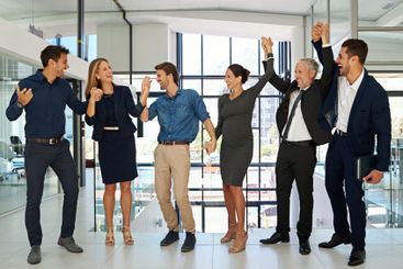 Business people, group and holding hands with...