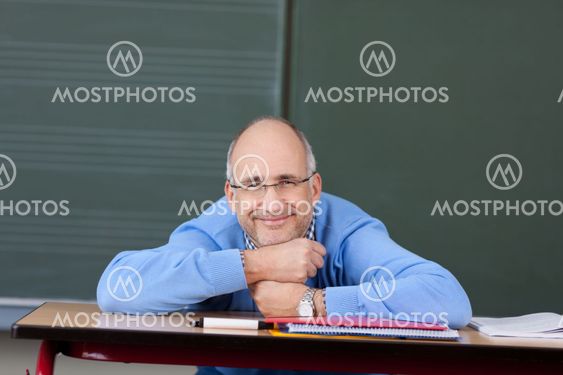 Friendly male teacher relaxing