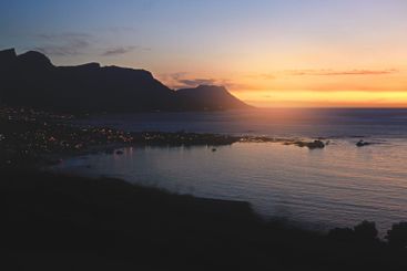 Mountain, sunset and sky with ocean for travel location,...