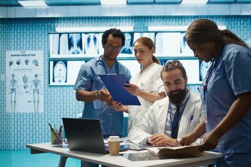 Experts team examine test results scans to develop...