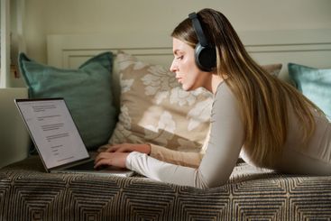 Young woman using typing working studying on laptop,...
