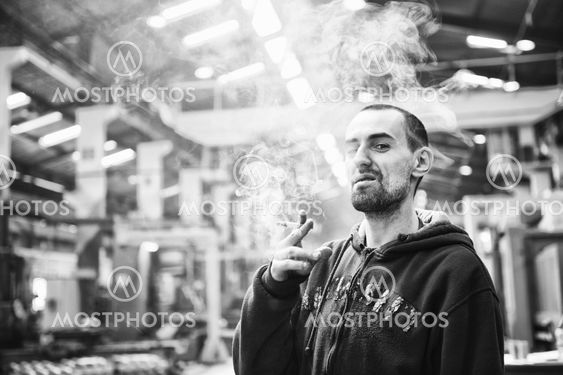 industry worker smoke cigarette