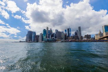 New York City skyline with skyscrapers reflecting sunlight
