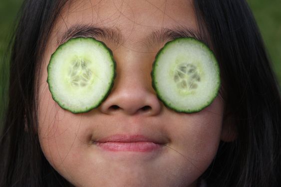 child and cucumber