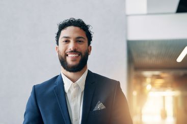 Office, happy and portrait of businessman in lobby for...