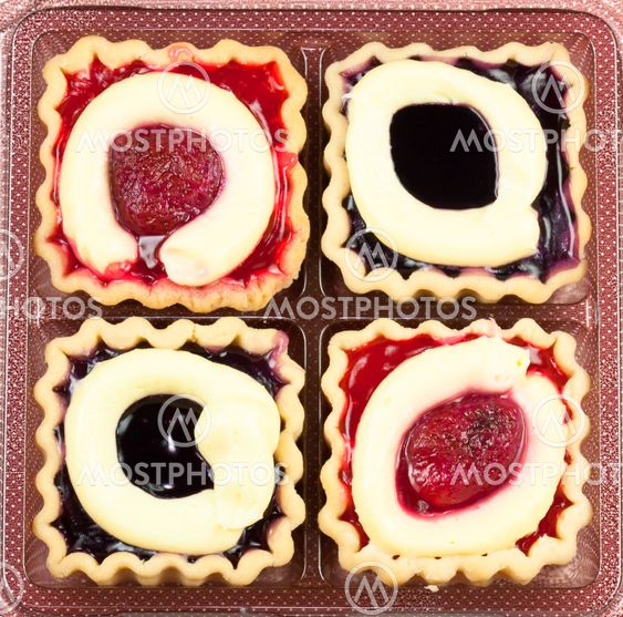 Close-up bakery cherry jam cake cup