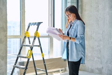 Female decorator of final finishing, repair manager in...