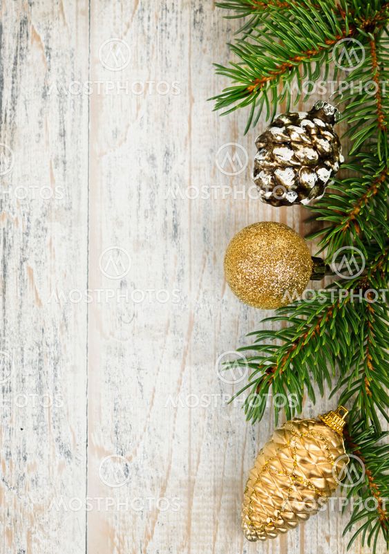 Christmas background with ornaments on branch