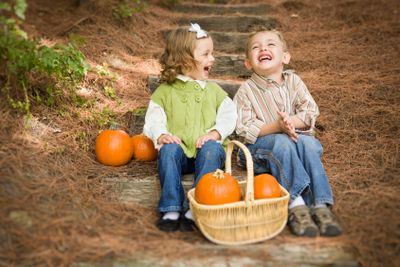 Brother and Sister Children Sitting on Wood Steps with...