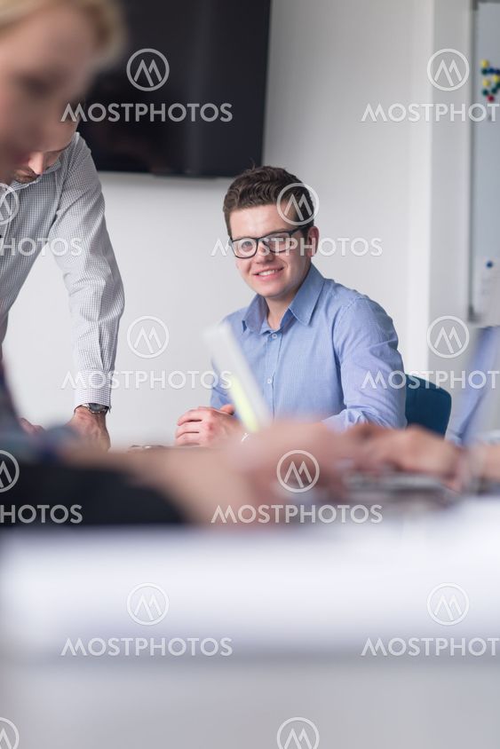 Group of young people meeting in startup office
