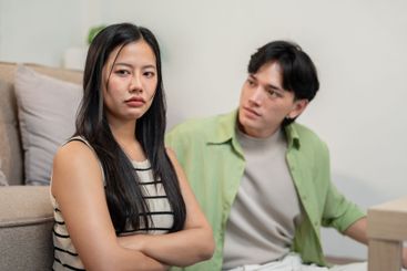 A moody and upset Asian girl has a conflict with her...