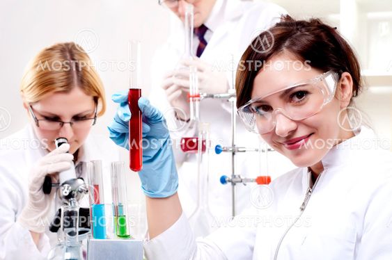 portrait of a beautiful woman chemist