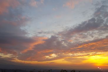 a sunset with a lot of clouds in the sky