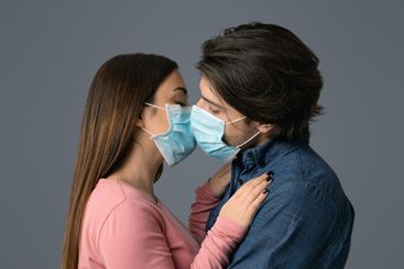 Quarantine Romantic. Young Couple Kissing Each Other...