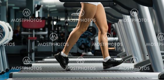 woman running on a treadmill