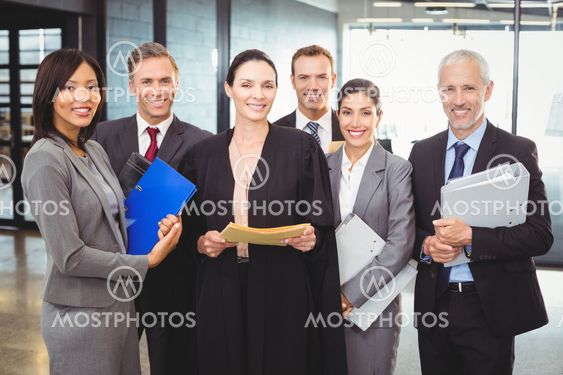 Lawyer standing together with businesspeople