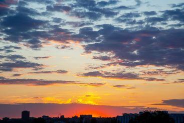 the sky after sunset is adorned with a vibrant mix of...