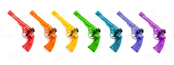 Toy plastic guns , on a white background