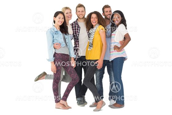 Happy group of young friends smiling at camera