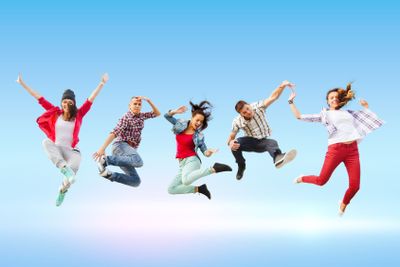 group of teenagers jumping