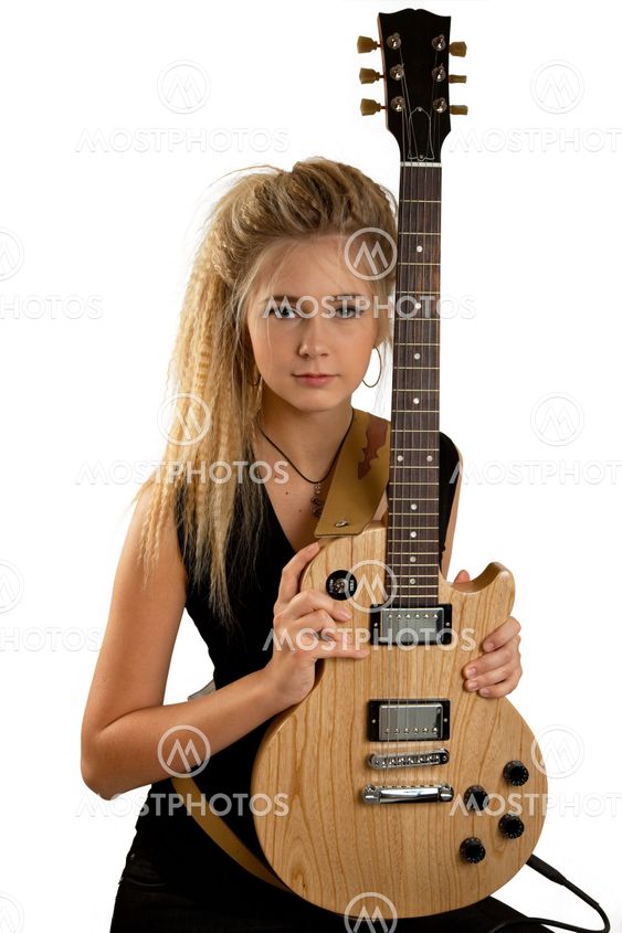 Rock Girl Playing An Electric Guitar