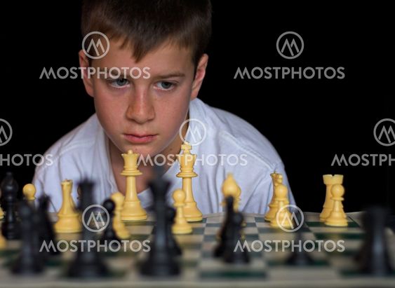 Boy Playing Chess