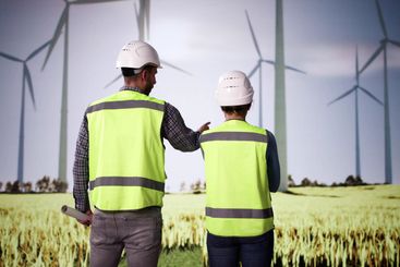 Wind Turbine Engineers At Green Energy Farm