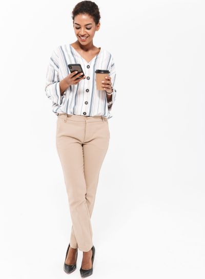 Full length portrait of a smiling young african...